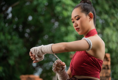 Thai Boxing Women prepare to training boxing and kickboxing for exercise at the old temple.の写真素材
