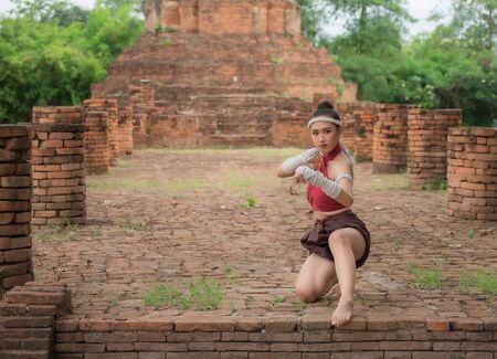Thai Boxing Women prepare to training boxing and kickboxing for exercise at the old temple.の写真素材