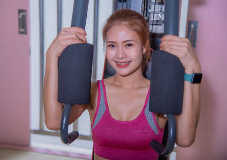 Young women play sports in the gym to exerciseの写真素材