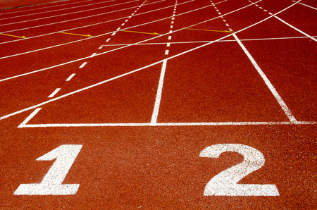 Start track. Lanes 1 2 of a red racing track.の写真素材