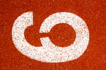Number six on the start of a running track - check my portfolio for other numbersの写真素材