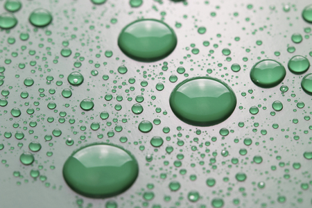 water drops on green backgroundの写真素材