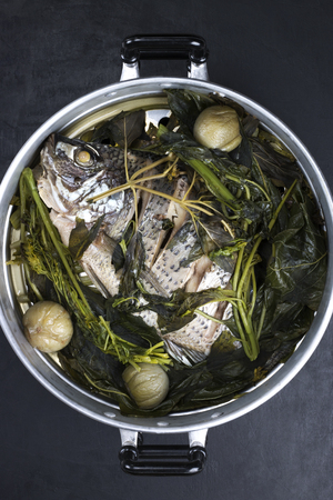 Steamed fish with vegetables and ingredients, thai foodの写真素材