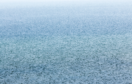 Texture of the rain on the lake surfaceの写真素材