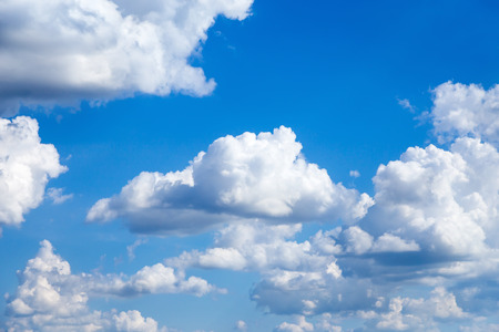 Cloudscape Blue sky with large white clouds. Beautiful big clouds slowly float against the blue sky.の写真素材