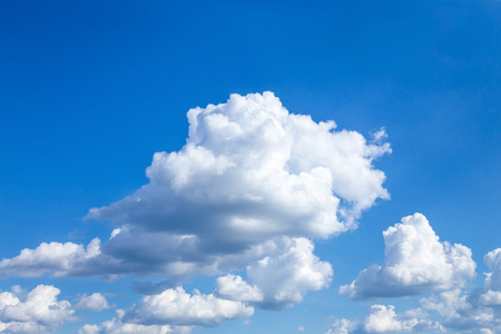 Cloudscape Blue sky with large white clouds. Beautiful big clouds slowly float against the blue sky.の写真素材