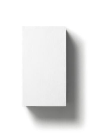 Blank business card isolated on white background. Top view. Stylish textured cardboard card for personal advertising or corporate design.の写真素材