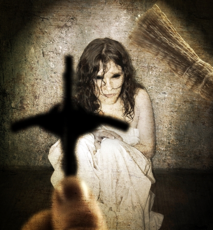 Exorcism and woman possessed by the devilの写真素材