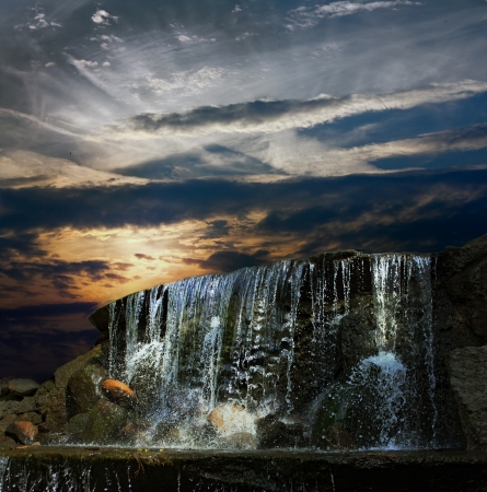 Waterfall at night at sunsetの写真素材
