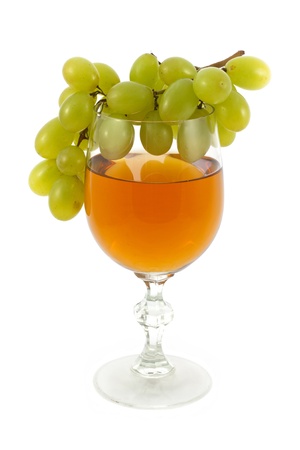 Glass of wine and grapesの写真素材