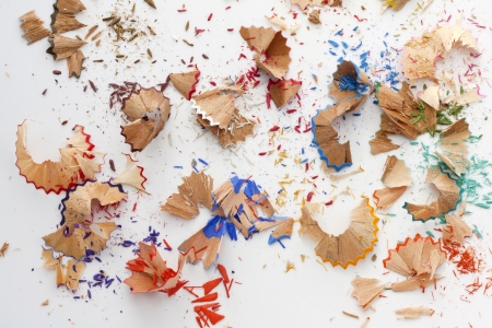 	Colorful pencils crayons shavings concept backgroundの写真素材