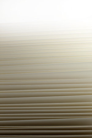 Closeup of vintage open book paper sheets texture background