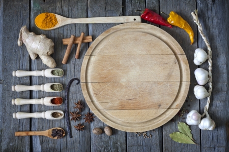 	Exotic spices and empty cutting board food backgroundの写真素材