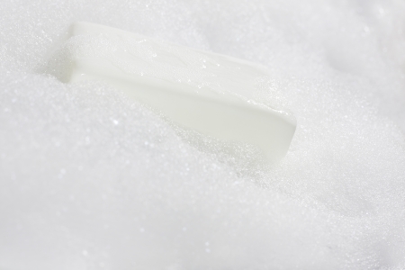 Foam with soap in the bathの写真素材
