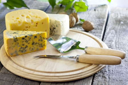 Cheese various assortment on wooden boardsの写真素材