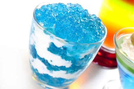 Dessert blue jelly in bowl with whipped creamの写真素材