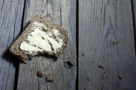 Slice of bread on vintage wooden boards concept