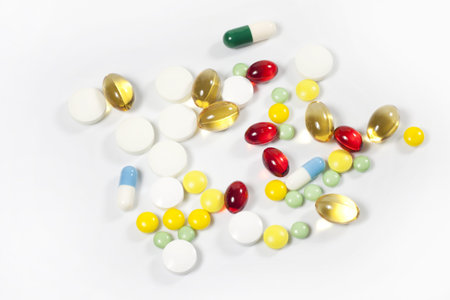 Medication and pills on white background