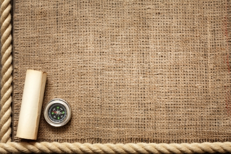 Old wooden planks and rope with compass vintage backgroundの写真素材
