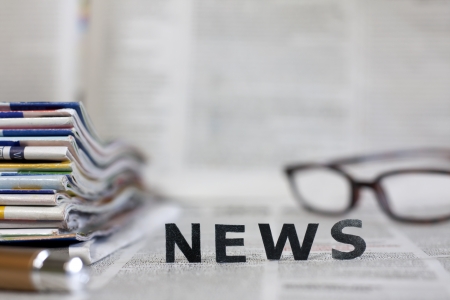 News letters on newspapers with blurred background concept の写真素材