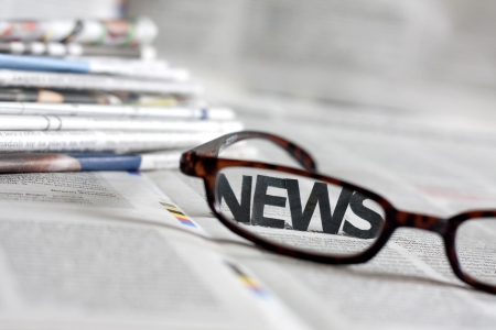 News letters on newspapers with blurred background concept の写真素材