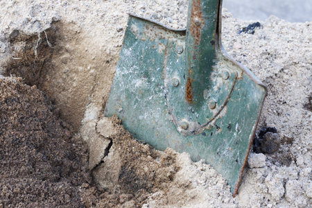 Shovel in soil closeup