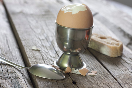 Boiled egg on vintage wooden boards food breakfast concept