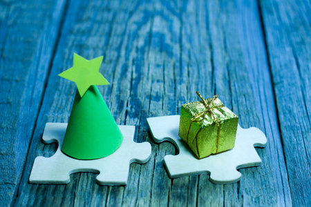 Abstract christmas tree and gift on puzzle preparation to holiday concept