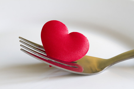 Heart on the fork abstract sign symbolの写真素材