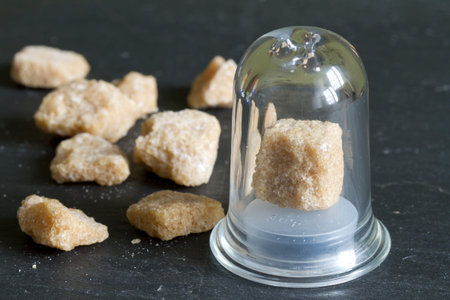Brown cube of cane sugar abstract food conceptの写真素材