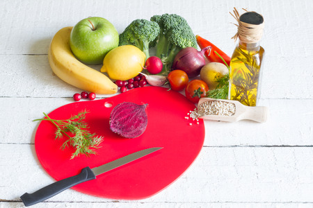 Diet and healthy food on a red heart abstract conceptの写真素材
