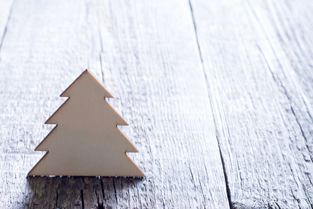 Christmas tree on wooden backgroundの写真素材