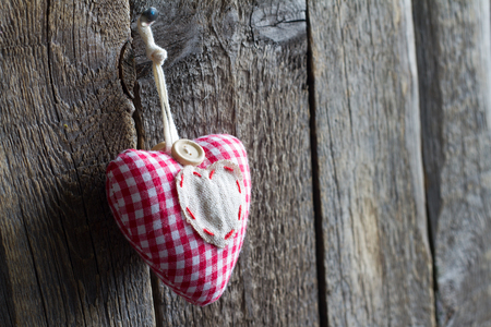 Old retro handmade heart on wooden boards love valentines conceptの写真素材
