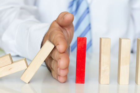Solving problem and domino effect. Abstract business conceptの写真素材