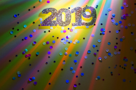 New year 2019 party colorful abstract background with lights and confettiの写真素材