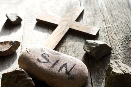 Cross sins and stones abstract easter confession religionの写真素材