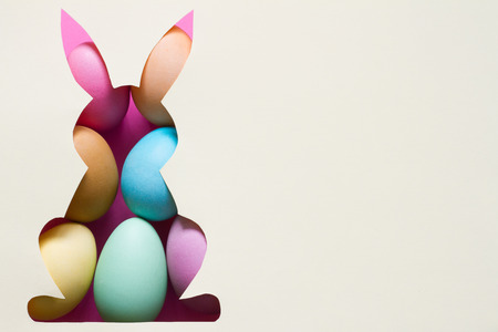 Silhouette of easter rabbit  and colorful egg abstract backgroundの写真素材