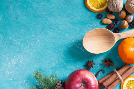 Christmas food background with fruits, spices and nutsの写真素材