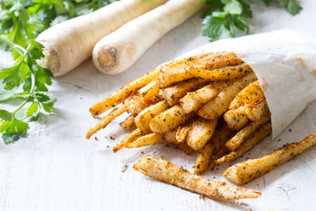 Healthy snack, crispy parsley fries with spicesの写真素材