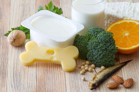 Bone shaped cheese and bone strengthening foods products, concept osteoporosis and preventionの写真素材