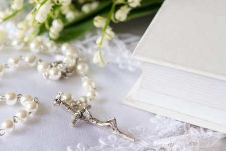 First Holy Communion with rosary and flowers, concept backgroundの写真素材