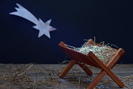 Manger and star of Bethlehem, abstract christmas nativity scene conceptの写真素材