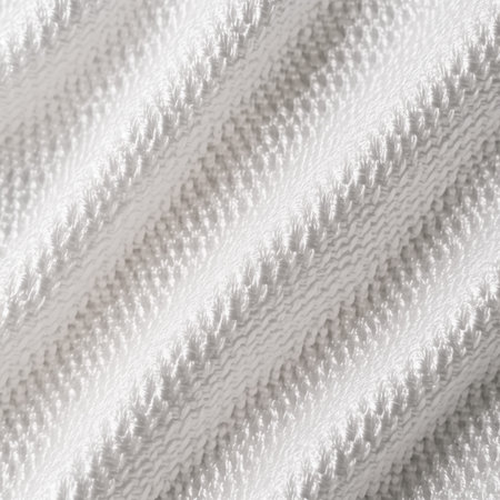 Close-up of a soft white towel. Abstract background and texture for design.の素材