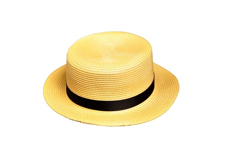 A yellow boater hat with black strapの写真素材