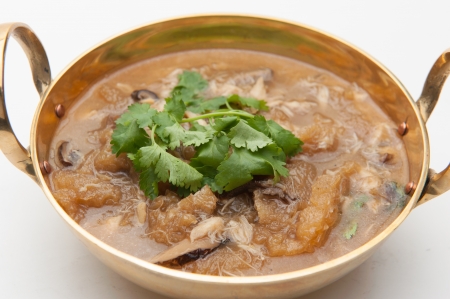 Fish maw soup on white table の写真素材