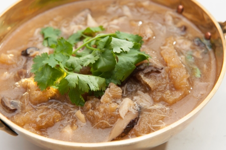 Fish maw soup on white table の写真素材