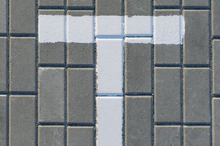 White dividing line on paving slabs in a city Parkの写真素材