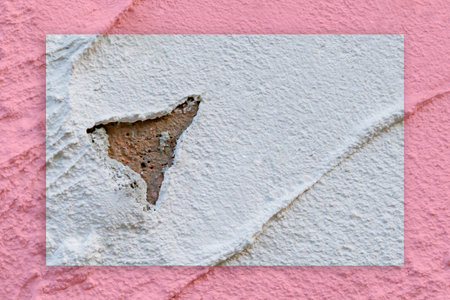 Fragment of fresh plaster on the wall of the house