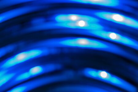 Fragment of multi-colored led strip in the coilの写真素材