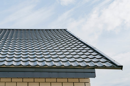 Metal roof of a new private house outside the city
